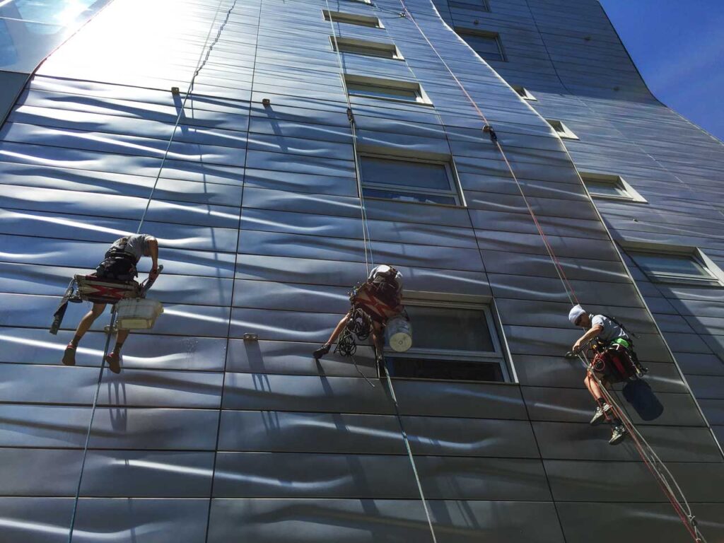 Cleaners rappel down HL 23, July 2015. Photo: Annik LaFarge, author of On the High Line