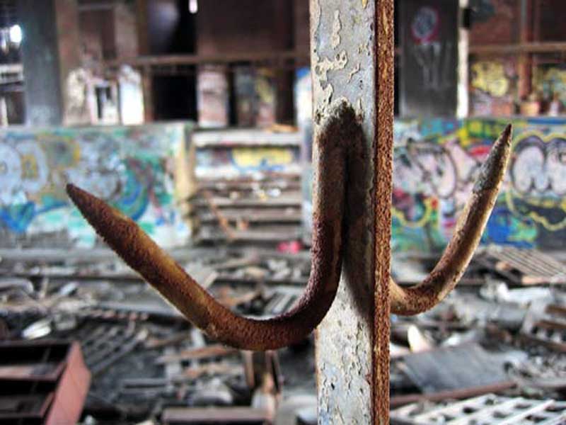 A rusting meat hook in the abandoned Chelsea Passage. Photo: Mike Epstein