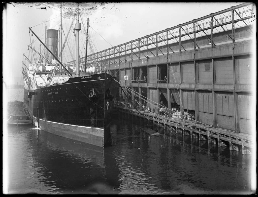 S.S. Carpathia docked at Chelsea Piers, 1912. According to the NYC Municipal Archive, historians suspect this photograph was probably taken after Carpathia arrived with survivors of the Titanic disaster. Photo: Municipal Archives, City of New York