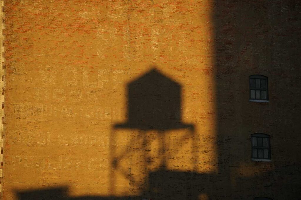 Shadow of a water tower, Eleventh Avenue. Photo: Annik LaFarge, author of On the High Line